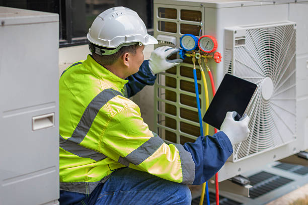 Professional Hvac Installation technician working in Island Park, NY